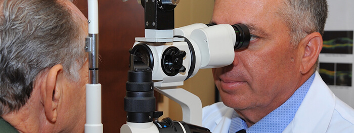 Doctor checking a patient for macular degeneration