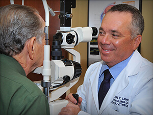 Orlando Eye Doctor John T. Lehr, M.D. performing an eye exam