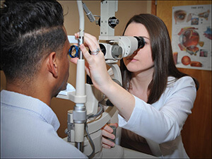 Patient receiving an eye exam.