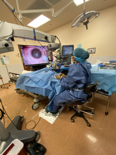  Dr. Sarina Amin, an eye surgeon at Magruder Eye Institute in Orlando, Fla., uses a 3D, heads-up display to perform retinal surgery on a patient